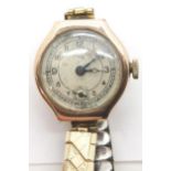 9ct gold cased vintage ladies wristwatch with swiss movement and expanding bracelet. P&P Group 1 (£