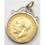 George V 1914 full sovereign in a 9ct gold loose mount, 9.8g. P&P Group 1 (£14+VAT for the first lot