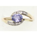 American 10ct diamond and blue stone ring, size S, 2.3g. P&P Group 1 (£14+VAT for the first lot