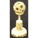 Antique Chinese ivory puzzle ball on ivory stand. P&P Group 1 (£14+VAT for the first lot and £1+