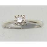 Contemporary 9ct white gold solitaire diamond engagement ring, size O, 2.5g. P&P Group 1 (£14+VAT