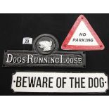 Three cast iron signs, Beware of the Dog, Dogs Running Loose and No Parking, Largest sign L: 36