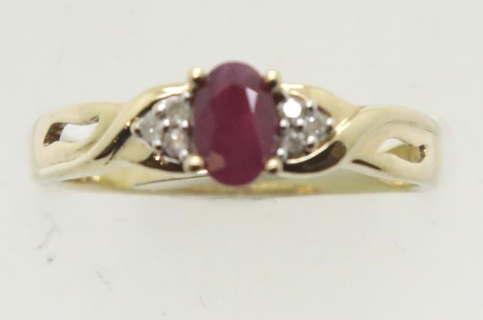 9ct gold ruby and diamond dress ring, size P, 2.4g. P&P Group 1 (£14+VAT for the first lot and £1+
