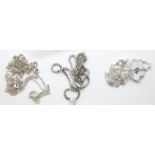 Two silver curb link necklaces L: 46 cm, diamond cut silver fine chain L: 46 cm and a silver box