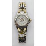 Tag Heuer ladies steel cased wristwatch, having white dial with luminescent baton chapters and