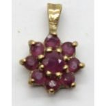 9ct gold ruby nine stone cluster pendant. P&P Group 1 (£14+VAT for the first lot and £1+VAT for