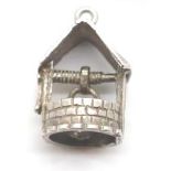 Three silver charms including rocking chair, well and slippers (see pictures). P&P Group 1 (£14+