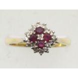 Vintage 18ct gold ruby and diamond cluster ring, circa 1975, size R, 4.2g. P&P Group 1 (£14+VAT