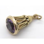 9ct gold tapered fob set with a large brilliant cut amethyst, 9.2g. P&P Group 1 (£14+VAT for the