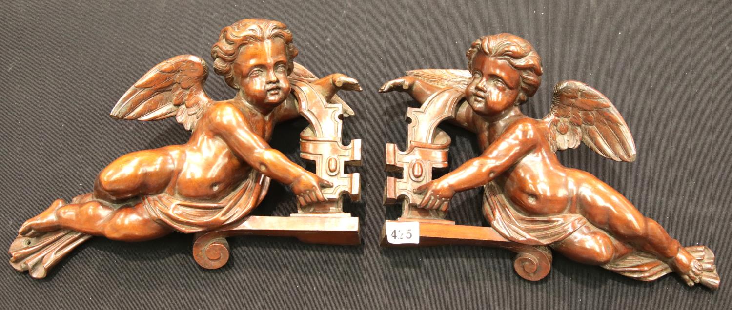 Pair of Regency carved cherubic door corbels, L: 29 cm. P&P Group 2 (£18+VAT for the first lot