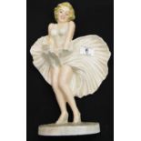 Cast iron Marilyn Monroe doorstop H: 33 cm. P&P Group 2 (£18+VAT for the first lot and £2+VAT for