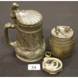 19th century continental pewter tankard, relief decorated with wheat having a monkey head finial, H: