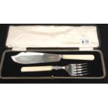 Hallmarked silver set of fish servers having ivorine handles and in original box. Sheffield assay,