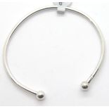 Silver solid torque bangle, 10.3g. P&P Group 1 (£14+VAT for the first lot and £1+VAT for
