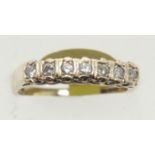 Vintage 9ct gold seven stone diamond half eternity ring, size M, 2.2g. P&P Group 1 (£14+VAT for