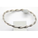 Vintage silver twist slave solid bangle. P&P Group 1 (£14+VAT for the first lot and £1+VAT for