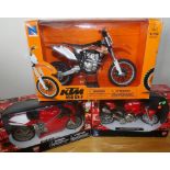 Three New Ray motorbike models, two Ducati and one KTM motorcross example P&P group 2 (£20 for the