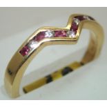 Ladies 18ct gold, ruby and diamond half wishbone ring size N 3.1g. P&P group 1 (£16 for the first