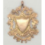 9ct gold antique 1920 fob medal with rampant lion 5.5g. P&P group 1 (£16 for the first item and £1.
