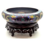 Chinese cloisonne censer bowl on associated carved hardwood stand, signed to base. P&P group 2 (£