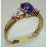 Ladies 14ct gold, tanzanite and diamond fancy ring size T 3.6g. P&P group 1 (£16 for the first