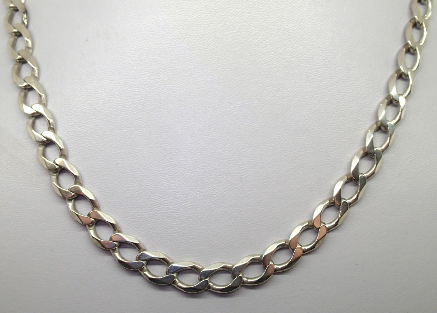 Gents 2011 silver curb chain 45g. P&P group 1 (£16 for the first item and £1.50 for subsequent