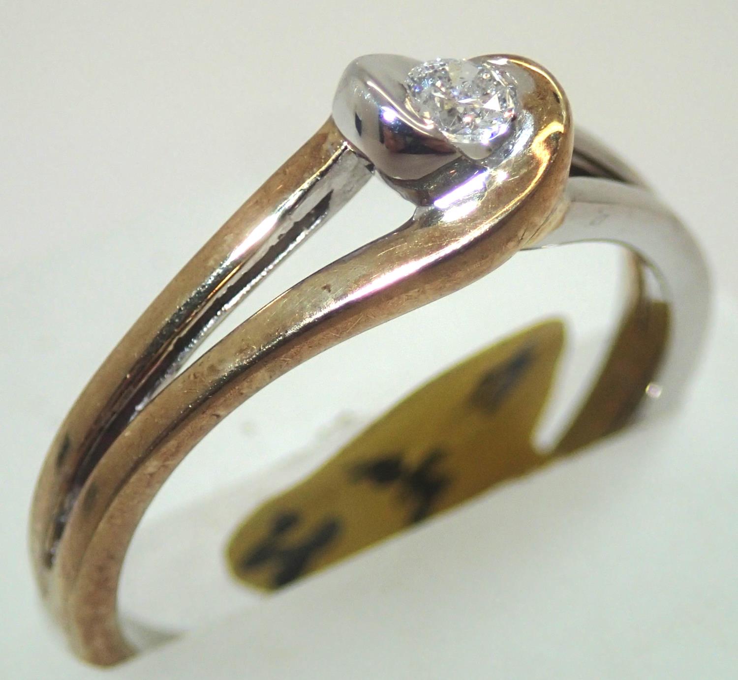 Ladies 9ct gold fancy diamond solitaire ring size P. P&P group 1 (£16 for the first item and £1.50