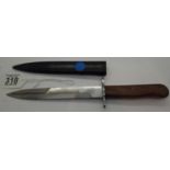 Wooden handled knife in metal scabbard, L: 29 cm, blade L: 18 cm. P&P Group 2 (£18+VAT for the first