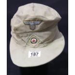 German WWII style peaked cap. P&P Group 2 (£18+VAT for the first lot and £2+VAT for subsequent lots)