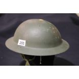 British WWII style helmet with liner and chinstrap. P&P Group 2 (£18+VAT for the first lot and £2+