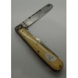 Ivory handled military folding knife and fork set marked Warranted English, c. 1880 - 1900. P&P