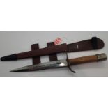 Wooden handled hunting knife and leather scabbard L: 28 cm, blade L: 17 cm. P&P Group 2 (£18+VAT for