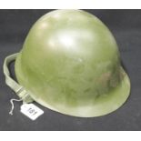 A Chinese PLA helmet with liner. P&P Group 2 (£18+VAT for the first lot and £2+VAT for subsequent