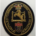 Fabric badge for Her Majesty's Riding Horse Department, H: 13 cm. P&P Group 1 (£14+VAT for the first