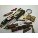 Mixed knives and lighters including Zippo. P&P Group 2 (£18+VAT for the first lot and £2+VAT for