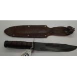 Wooden handled sheath knife in leather scabbard L: 30 cm, blade L: 19 cm. P&P Group 2 (£18+VAT for