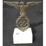 German WWII type flagpole finial mounted in a marble block, H: 22 cm including base. P&P Group 2 (£