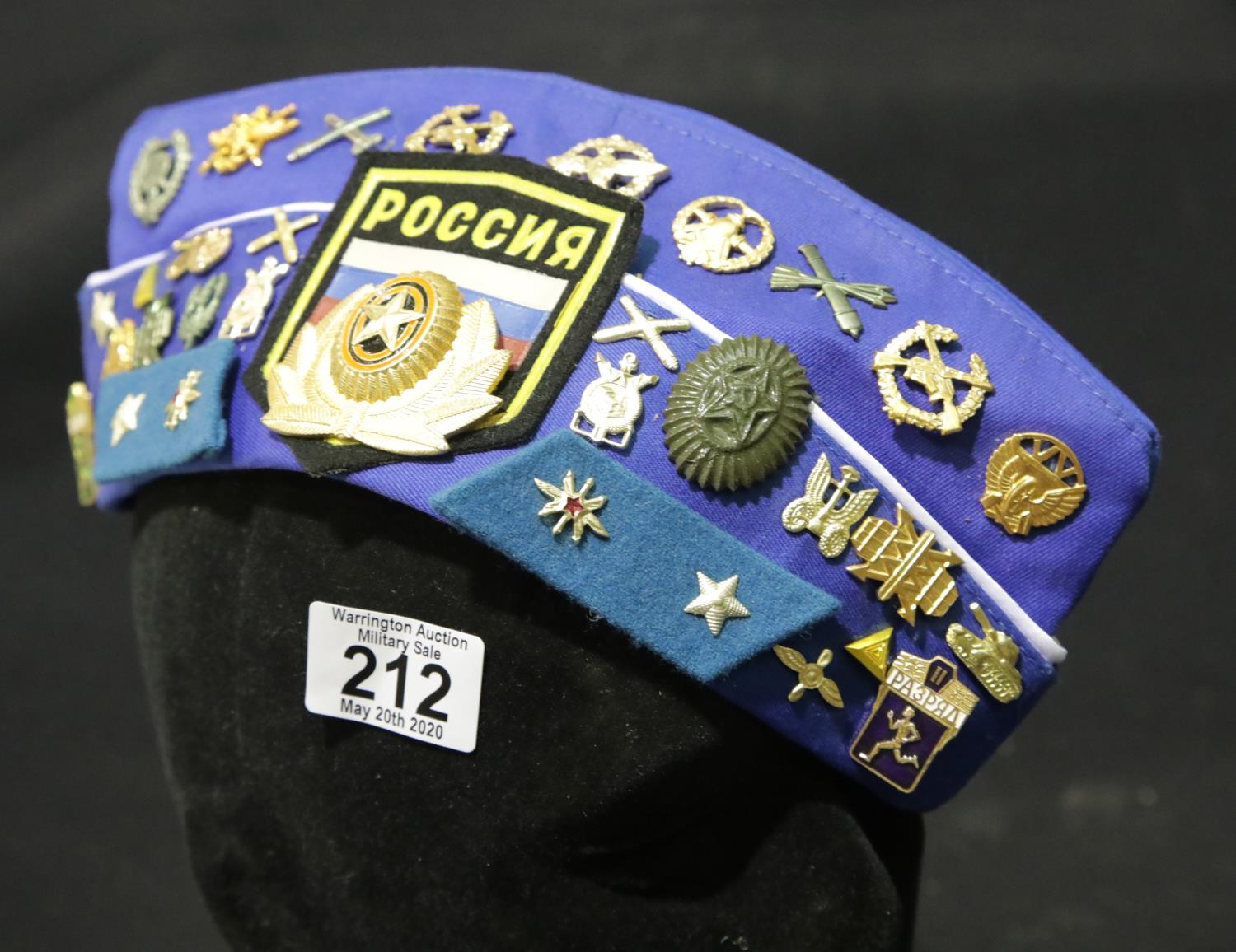 Russian field cap with a large quantity of badges. P&P Group 2 (£18+VAT for the first lot and £2+VAT