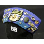 Russian field cap with a large quantity of badges. P&P Group 2 (£18+VAT for the first lot and £2+VAT