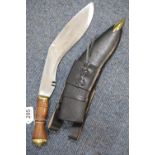 Modern Eastern kukri in leather sheath and frog, L: 45 cm, blade L: 32 cm. P&P Group 2 (£18+VAT