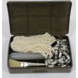 Plastic cased military gun cleaning kit. P&P Group 1 (£14+VAT for the first lot and £1+VAT for