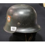 German WWII style helmet with liner, chinstrap and Swastika decals. P&P Group 2 (£18+VAT for the