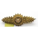 Victorian 15ct fancy pearl set brooch, 4.6g. P&P Group 1 (£14+VAT for the first lot and £1+VAT for