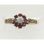 9ct gold ruby and diamond cluster ring, size M, 1.7g. P&P Group 1 (£14+VAT for the first lot and £