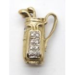 9ct gold stone set charm - golf bag with clubs, 6.5g. P&P Group 1 (£14+VAT for the first lot and £