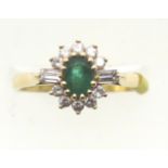 18ct gold high grade emerald and diamond cocktail ring with raised setting, size N, 3.2g. P&P