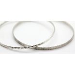Two solid silver diamond cut slave bangles. P&P Group 1 (£14+VAT for the first lot and £1+VAT for