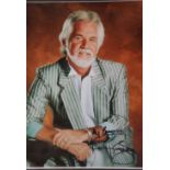 Kenny Rogers, framed signed photograph, 24 x 19 cm, with CoA from Todd Mueller. P&P Group 2 (£18+VAT