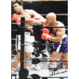 Earnie Shavers signed photograph vs Muhammad Ali with Allstars 29332 sticker, 20 x 25 cm. P&P