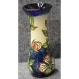 Moorcroft urn/vase in the Pink Hibiscus pattern, H: 13 cm. P&P Group 1 (£14+VAT for the first lot
